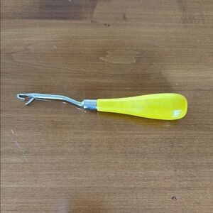 Yellow Rug Hook Tool with Metal Tip and Wooden handle
